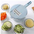 Der Hobel mit Karotten-Julienne, Zucchini und Waffelkartoffeln
