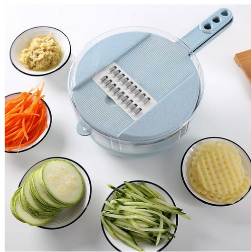 The slicer with julienned carrot, courgette and waffle cut potato