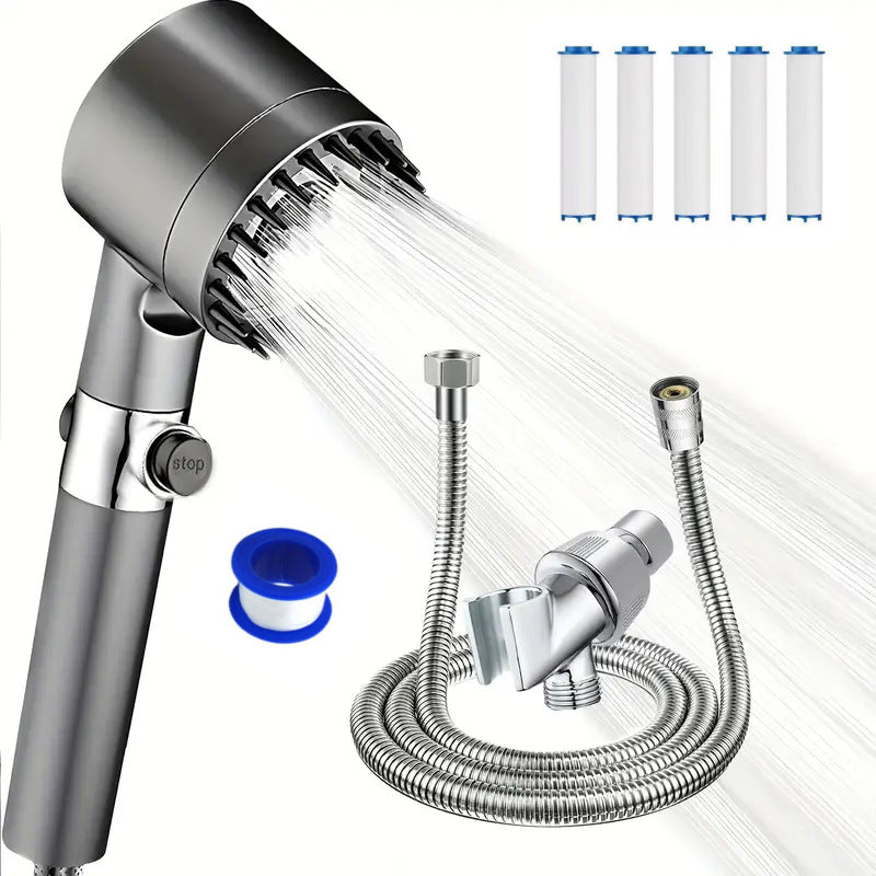 The shower head running, with the spare cartridges and fittings