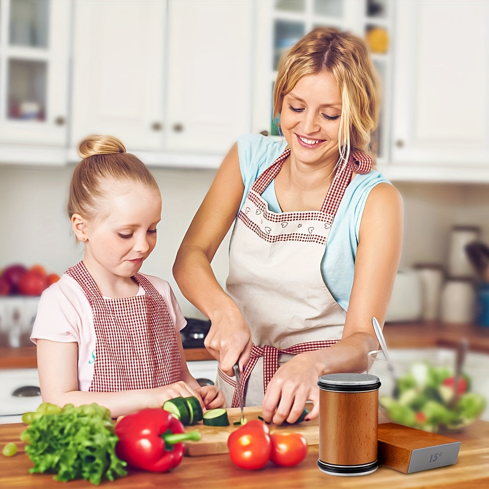 Two people cooking together at a kitchen counter, with the sharpener and the 15° side of its base shown in the corner.