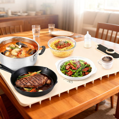 The mat unrolled on a wooden dining table, dishes keeping warm on it