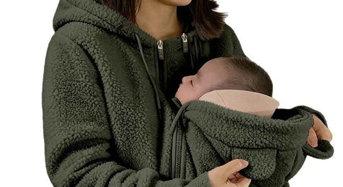 The pouch open, with the flap folded back over the baby